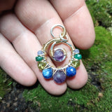 Gold, Silver, Tanzanite, Emerald, Peridot, Kyanite, and Amethyst Spiral Pendant