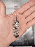 Silver and Copper Vogul Crystal Pendant