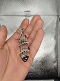 Silver and Copper Vogul Crystal Pendant
