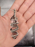 Silver and Copper Vogul Crystal Pendant